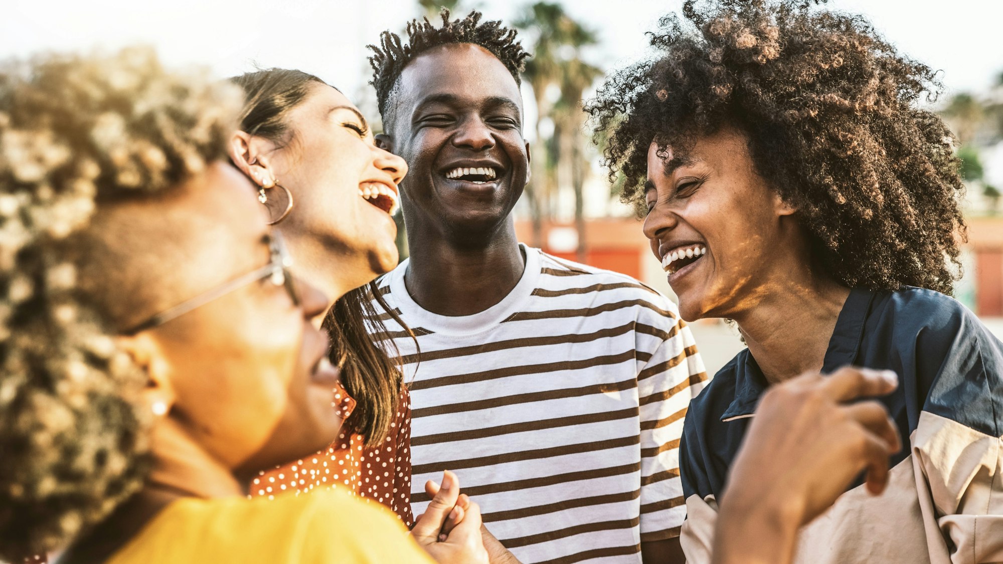 Young happy people laughing together